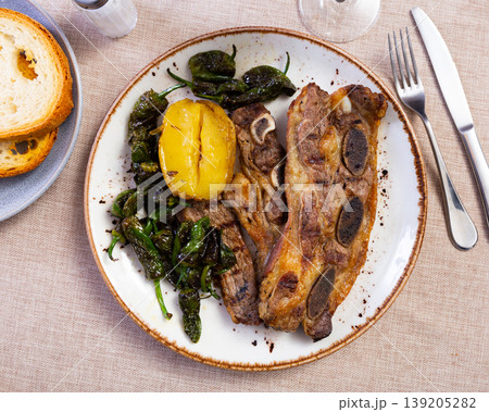National Spanish dish is Churasco with potatoes and pepper National Spanish dish is Churasco with potatoes and pepper 139205282