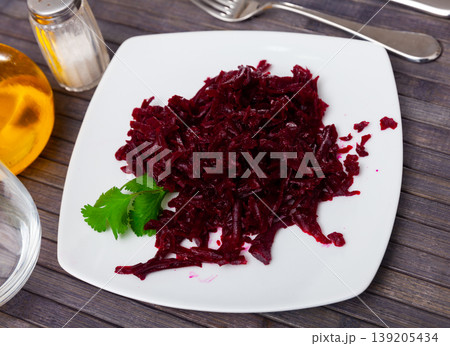 Healthy salad of shredded boiled beets with greens Healthy salad of shredded boiled beets with greens 139205434