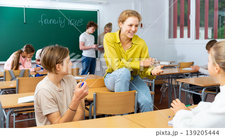 Teenagers during recess in school Teenagers during recess in school 139205444