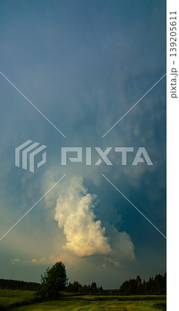 Storm clouds of thunderstorm over a field in Lithuania 139205611