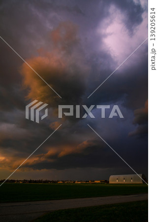 Storm clouds of thunderstorm over a field in Lithuania 139205614