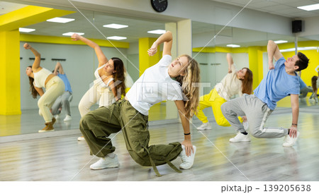 Group portrait of lucky teenagers in dance studio Group portrait of lucky teenagers in dance studio 139205638