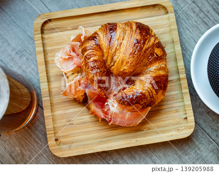 Croissant with ham served on platter Croissant with ham served on platter 139205988