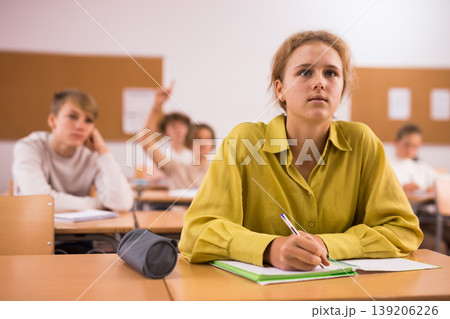 Teenage girl in classroom during lesson in school 139206226