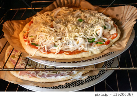 Homemade pizza with healthy ingredients and a gluten free crust Homemade pizza with healthy ingredients and a gluten free crust 139206367