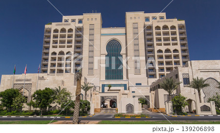Building of luxurious 5-star hotel in Ajman timelapse hyperlapse nestled near the turquoise waters of Arabian Gulf. 139206898