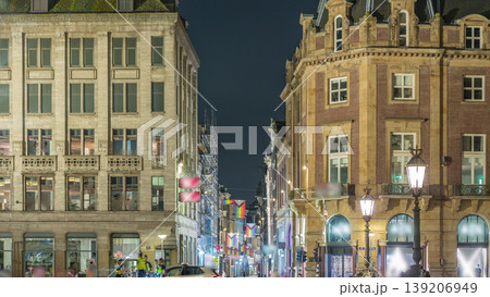 The Dam square in Amsterdam night timelapse, The Netherlands. The Dam square in Amsterdam night timelapse, The Netherlands. 139206949