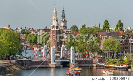 City of Amsterdam aerial timelapse featuring the Montelbaanstoren tower. Netherlands 139206978