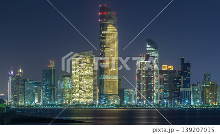 Panorama view of Abu Dhabi Skyline and seafront at night timelapse, United Arab Emirates Panorama view of Abu Dhabi Skyline and seafront at night timelapse, United Arab Emirates 139207015