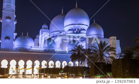 Sheikh Zayed Grand Mosque illuminated at night timelapse, Abu Dhabi, UAE. Sheikh Zayed Grand Mosque illuminated at night timelapse, Abu Dhabi, UAE. 139207063