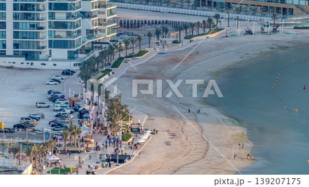 Beach on Al Reem island in Abu Dhabi during sunset timelapse from above. Beach on Al Reem island in Abu Dhabi during sunset timelapse from above. 139207175