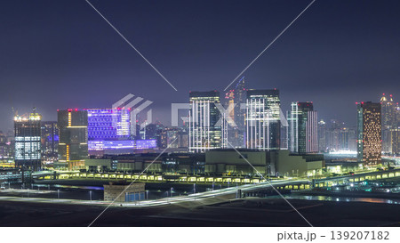 Buildings on Al Reem island in Abu Dhabi night timelapse from above. Buildings on Al Reem island in Abu Dhabi night timelapse from above. 139207182