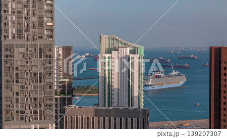 Singapore Cruise Centre is a cruise terminal aerial timelapse in HarbourFront. 139207307