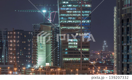 Beautiful lights in Dubai with constructing aerial timelapse Beautiful lights in Dubai with constructing aerial timelapse 139207332