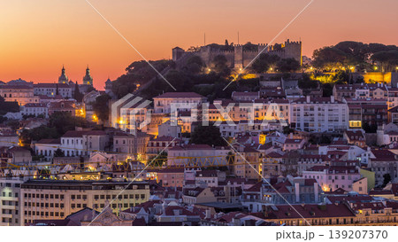 Lisbon aerial cityscape skyline night to day timelapse from viewpoint of St. Peter of Alcantara, Portugal Lisbon aerial cityscape skyline night to day timelapse from viewpoint of St. Peter of Alcantara, Portugal 139207370