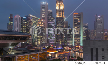 Colorful of Singapore Central business district day to night timelapse cityscape skyline at Marina Bay with Singapore Academy of Law Colorful of Singapore Central business district day to night timelapse cityscape skyline at Marina Bay with Singapore Academy of Law 139207401