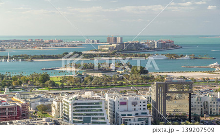 Palm Jumeirah and internet city aerial timelapse. Dubai, United Arab Emirates Palm Jumeirah and internet city aerial timelapse. Dubai, United Arab Emirates 139207509