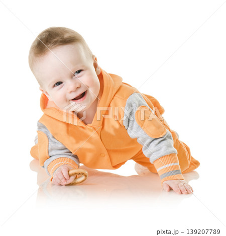 Smiling baby with bagel 139207789