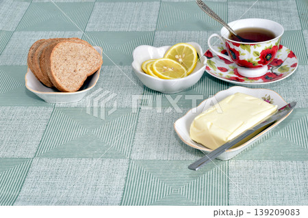 Table setting for breakfast or tea. Table setting for breakfast or tea. 139209083
