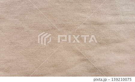 soft beige ribbed knit texture closeup seamless pattern neutral background for design wallpaper banner 139210075
