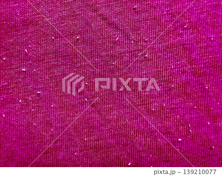 vibrant magenta knit fabric closeup with subtle lint specks soft textured surface for wallpaper or banner copy space vibrant magenta knit fabric closeup with subtle lint specks soft textured surface for wallpaper or banner copy space 139210077