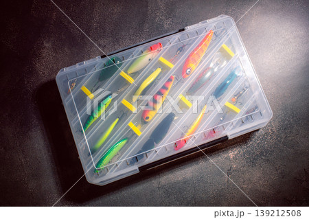 Fishing Tackle Box Organized with Various Lures. Fishing equipment and accessories Fishing Tackle Box Organized with Various Lures. Fishing equipment and accessories 139212508