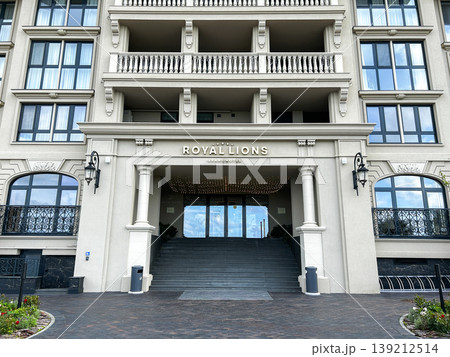 Russia, Kaliningrad - 11/08/2025. Entrance of Royal Grand Hotel Five stars hotel. Modern building entrance and facade Russia, Kaliningrad - 11/08/2025. Entrance of Royal Grand Hotel Five stars hotel. Modern building entrance and facade 139212514