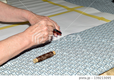 The cutter works with fabric and patterns. The cutter works with fabric and patterns. 139213095