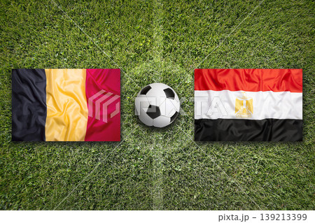 Belgium vs. Egypt flags on a soccer field 139213399