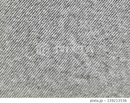 gray twill fabric texture closeup diagonal weave pattern minimalist industrial background evoking urban elegance and subtle durability for design projects gray twill fabric texture closeup diagonal weave pattern minimalist industrial background evoking urban elegance and subtle durability for design projects 139213536