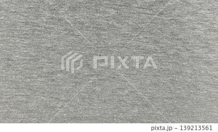 heather gray knit fabric texture closeup revealing soft ribbed patterns and subtle fiber details for apparel design inspiration 139213561