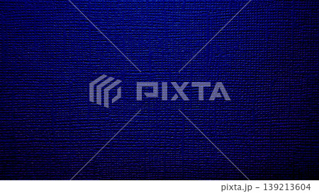 deep indigo blue woven fabric texture gleaming in closeup evoking midnight elegance and subtle sheen for design backdrops 139213604