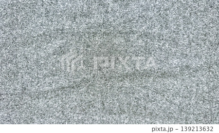 closeup of vintage television static noise on gray screen abstract speckled texture pattern for digital background 139213632