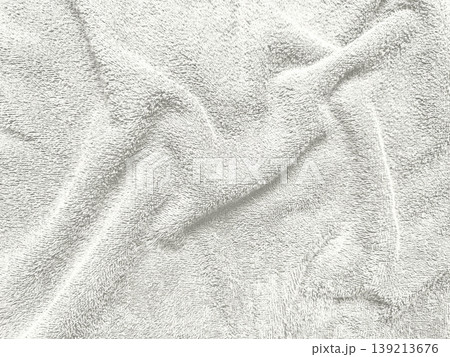 white fluffy terry cloth texture close up with gentle folds and soft loops evoking luxurious spa serenity and cozy comfort background white fluffy terry cloth texture close up with gentle folds and soft loops evoking luxurious spa serenity and cozy comfort background 139213676