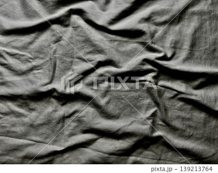 wrinkled corduroy fabric texture closeup revealing fine wales deep folds subtle shadows minimalist abstract background evoking vintage tactile appeal wrinkled corduroy fabric texture closeup revealing fine wales deep folds subtle shadows minimalist abstract background evoking vintage tactile appeal 139213764