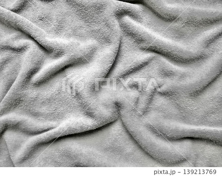 luxurious soft gray fleece fabric undulating in subtle waves for minimalist design background luxurious soft gray fleece fabric undulating in subtle waves for minimalist design background 139213769