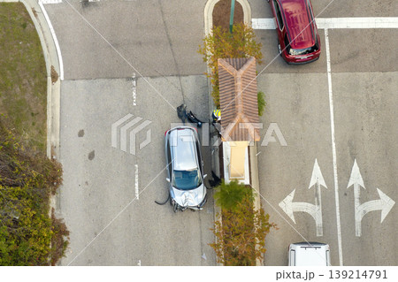 Traffic accident on American street in Florida. First responders helping victims of car crash on road in USA. Aerial view of emergency services responding to accident site Traffic accident on American street in Florida. First responders helping victims of car crash on road in USA. Aerial view of emergency services responding to accident site 139214791