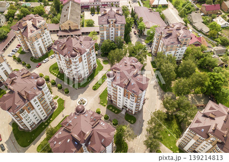 Top view of apartment or office tall buildings, parked cars, urban city landscape. Drone aerial photography. 139214813