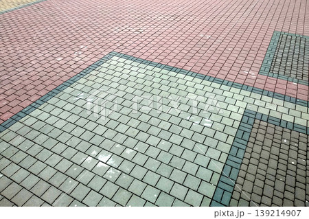 Stone pavement in perspective. Granite cobblestone pavement tiles. Stone pavement in perspective. Granite cobblestone pavement tiles. 139214907