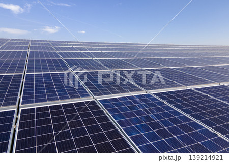 Solar rooftop on commercial structure. Photovoltaic panels for producing of clean ecological electrical energy. Concept of autonomous building Solar rooftop on commercial structure. Photovoltaic panels for producing of clean ecological electrical energy. Concept of autonomous building 139214921
