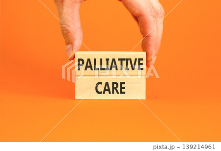 Palliative care words symbol. Concept words Palliative care on beautiful wooden blocks. Beautiful orange background. Doctor hand. Medical and Palliative care words concept. Copy space. Palliative care words symbol. Concept words Palliative care on beautiful wooden blocks. Beautiful orange background. Doctor hand. Medical and Palliative care words concept. Copy space. 139214961
