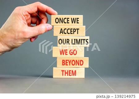 Beyond limits symbol. Concept words Once we accept our limits we go beyond them on wooden Sticks. Beautiful grey background. Business Once we accept our limits we go beyond them concept. Copy space. Beyond limits symbol. Concept words Once we accept our limits we go beyond them on wooden Sticks. Beautiful grey background. Business Once we accept our limits we go beyond them concept. Copy space. 139214975