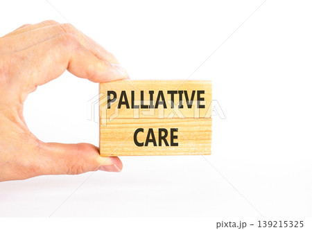 Palliative care words symbol. Concept words Palliative care on beautiful wooden blocks. Beautiful white background. Doctor hand. Medical and Palliative care words concept. Copy space. Palliative care words symbol. Concept words Palliative care on beautiful wooden blocks. Beautiful white background. Doctor hand. Medical and Palliative care words concept. Copy space. 139215325