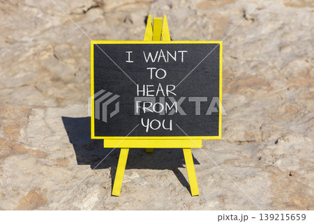 I want to hear from you symbol. Concept words I want to hear from you on beautiful black blackboard. Beautiful stone background. Business support I want to hear from you concept. Copy space. I want to hear from you symbol. Concept words I want to hear from you on beautiful black blackboard. Beautiful stone background. Business support I want to hear from you concept. Copy space. 139215659