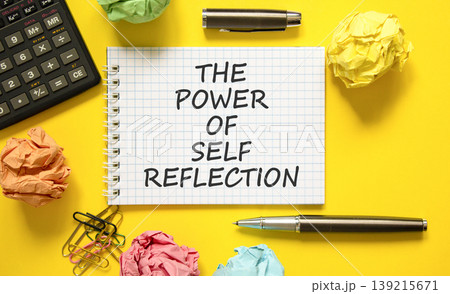 Self reflection symbol. Concept words The power of self reflection on beautiful white note. Beautiful yellow background. Black calculator. Business the power of self reflection concept. Copy space. 139215671