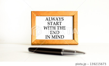 Start with the end in mind symbol. Concept words Always start with the end in mind on beautiful wooden picture frame. Beautiful white background. Business start with end in mind concept. Copy space. Start with the end in mind symbol. Concept words Always start with the end in mind on beautiful wooden picture frame. Beautiful white background. Business start with end in mind concept. Copy space. 139215673