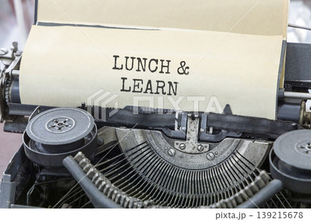 Lunch and learn symbol. Concept words Lunch and learn typed on beautiful old retro typewriter. Beautiful white paper background. Business, educational and lunch and learn concept. Copy space. Lunch and learn symbol. Concept words Lunch and learn typed on beautiful old retro typewriter. Beautiful white paper background. Business, educational and lunch and learn concept. Copy space. 139215678
