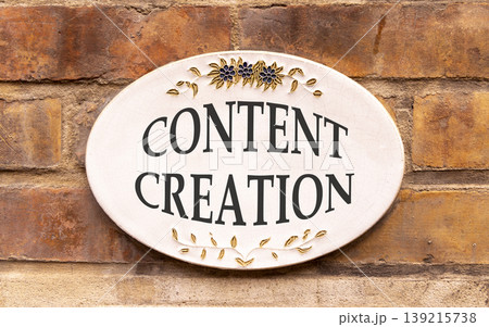 Time for content creation symbol. Concept words Content creation on beautiful big white sign plate. Beautiful old brown brick wall background. Business time for content creation concept. Copy space Time for content creation symbol. Concept words Content creation on beautiful big white sign plate. Beautiful old brown brick wall background. Business time for content creation concept. Copy space 139215738