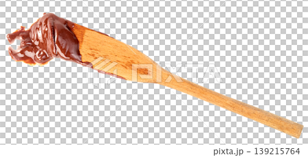 Wooden spatula with a thick smear of dark chocolate cream or hazelnut spread isolated. Professional tool for baking, dessert preparation, and sweet food concept imagery. Wooden spatula with a thick smear of dark chocolate cream or hazelnut spread isolated. Professional tool for baking, dessert preparation, and sweet food concept imagery. 139215764
