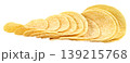 Stack of thin and crispy potato chips isolated. Golden yellow salty snacks arranged in a neat row. Tasty fast food and junk food appetizer for parties. Close up studio shot. 139215768